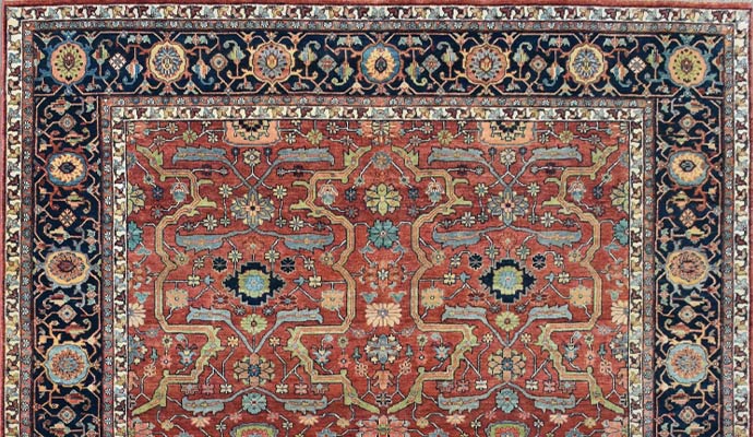 A red rug has a floral lattice.