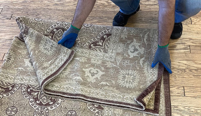 folding rug after cleaning