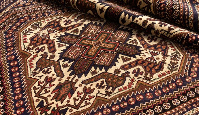 Oriental rug with animal and geometric patterns