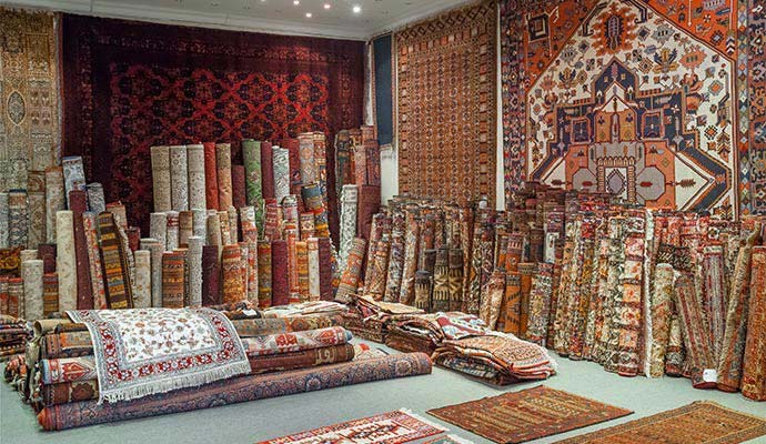 Showroom filled with oriental rugs