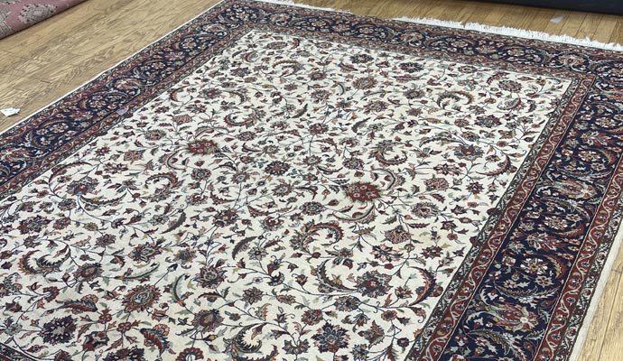 Traditional rug on floor